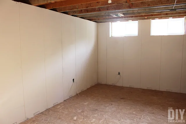 Smartwall Installation In Our Basement, How To Plumb A Basement Wall