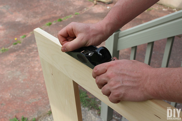 Use a hand planer if the door is too tight.
