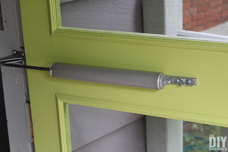 Install a hydraulic door closer so that the door closes on its own.