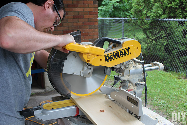 Use a miter saw to cut board.