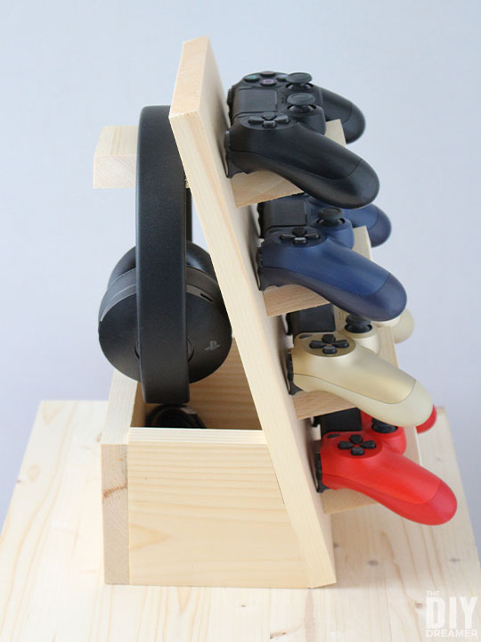 DIY controller stand with a charging port, headphone stand, and storage box.
