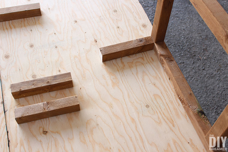 Add pieces of wood at each intersection