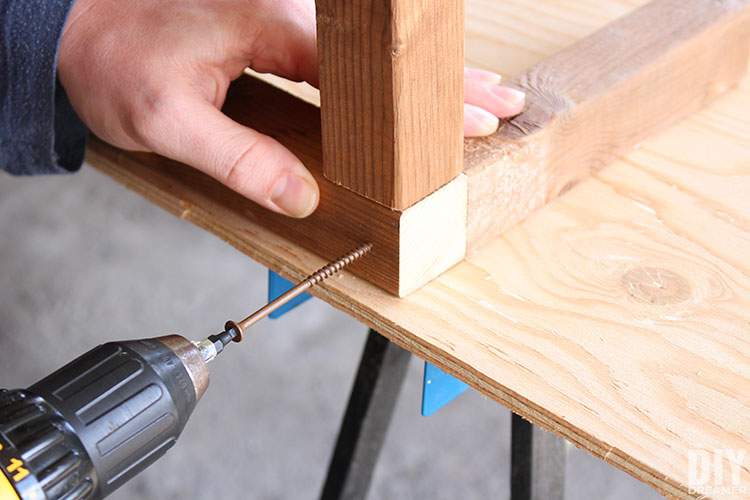 Add screw to attach pieces to the frame