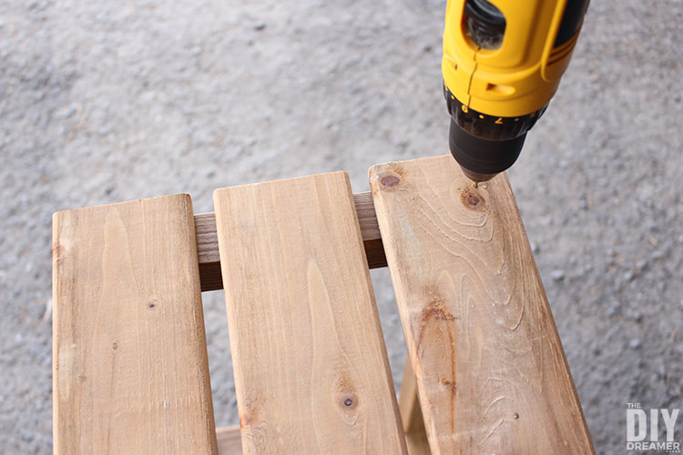 Drill holes into the boards