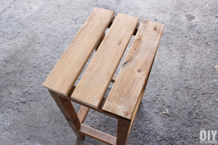 Stool seat with drill holes